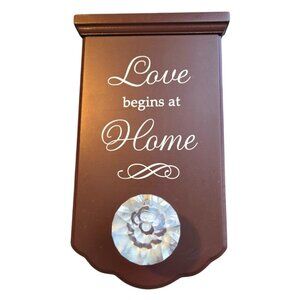 "Love begins at Home" plaque